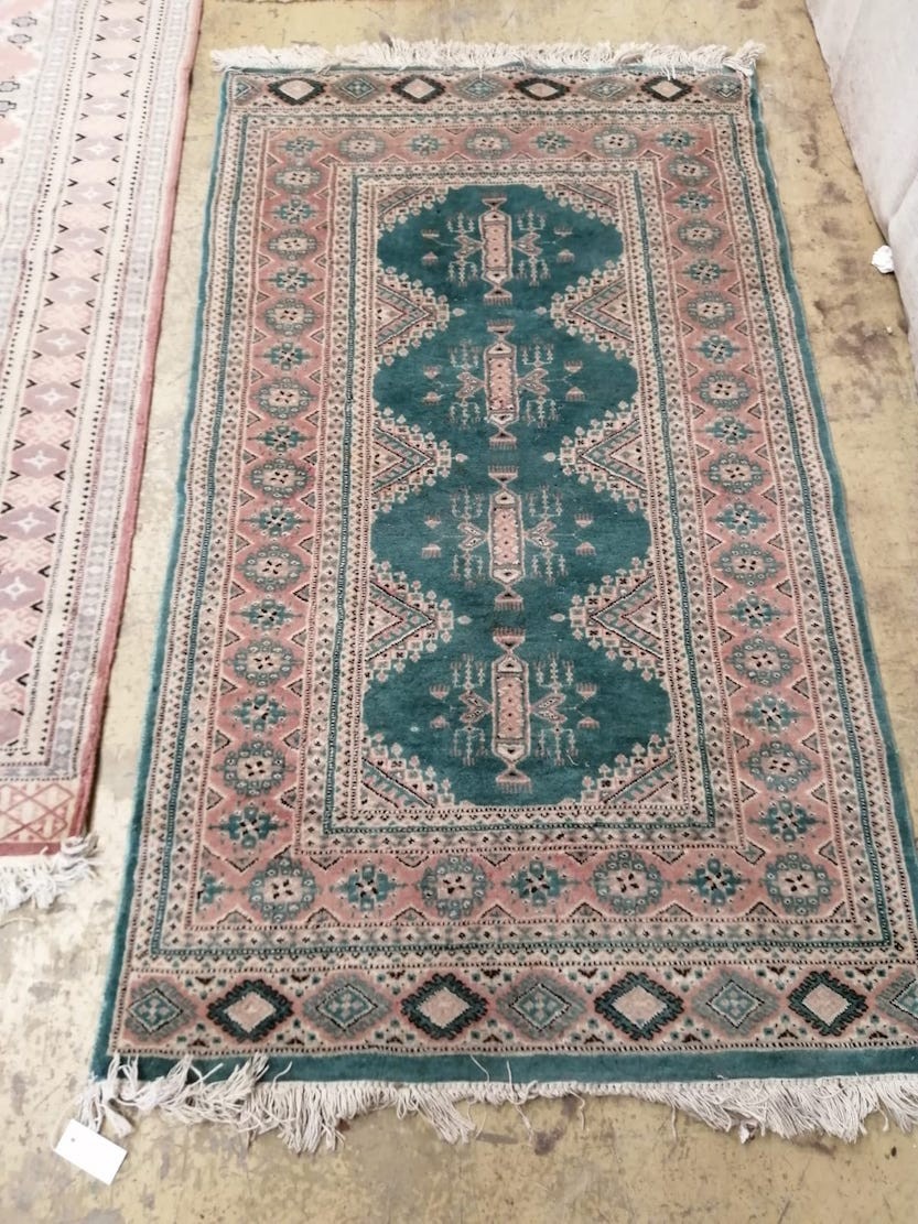 Three North West Persian design runners and rugs, largest 306 x 80cm